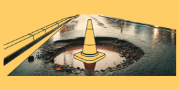 Illustration of a traffic cone in a pothole.