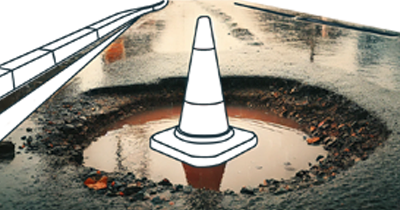 Illustration of a traffic cone in a pothole